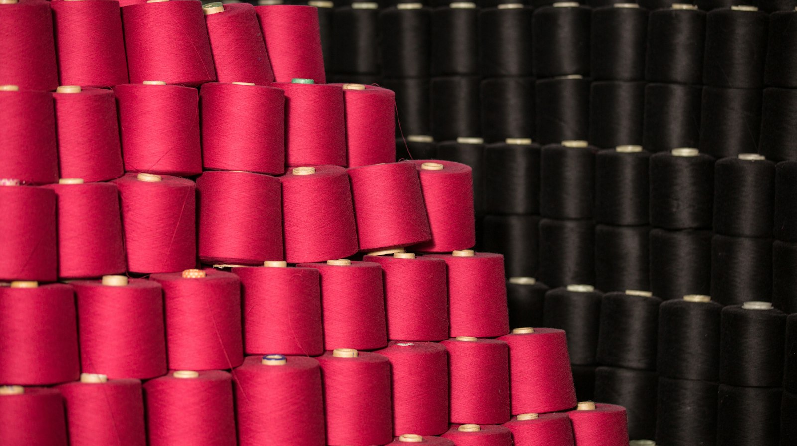 Rows of thread spools ready for a production run